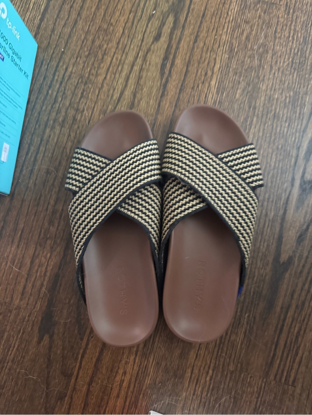 Rothy's Brown Footbed Black and Cream Cross-Strap Sandals
